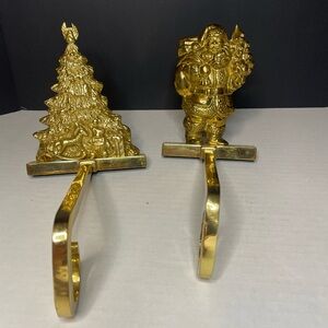 Vintage Lot Of 2 Brass Long Arm Stocking Holders Santa And Tree With Presents.